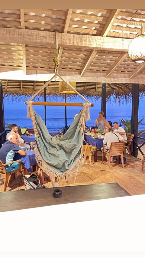 Restaurant/places to eat, Seating area, Sea view, Sunset, group of guests