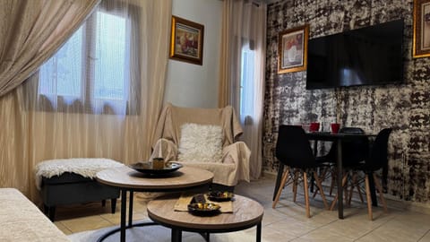 Bed, TV and multimedia, Living room, Seating area, Dining area