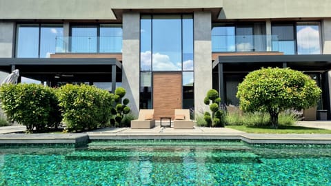 Property building, Day, View (from property/room), Seating area, Pool view, Swimming pool, Swimming pool, Swimming pool, Time of day