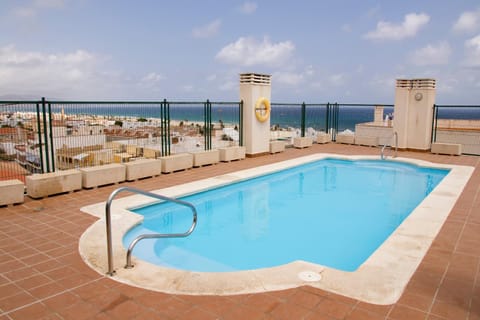 Property building, Living room, Swimming pool