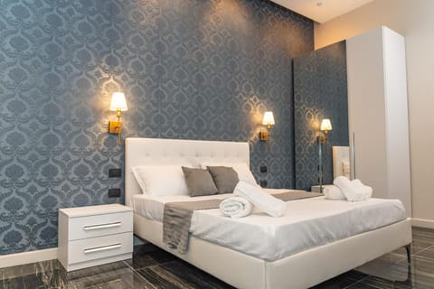 Bed, Photo of the whole room, Bedroom, towels, wardrobe