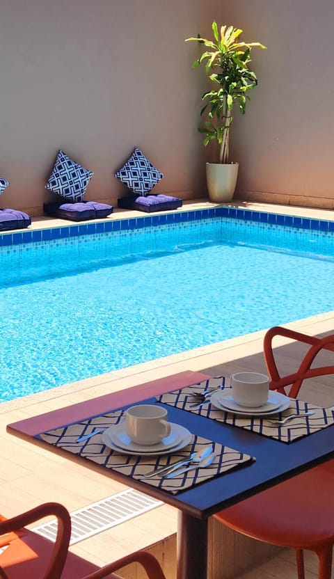 Property building, Seating area, Pool view, Swimming pool, Breakfast