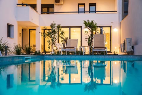 Property building, Pool view, Swimming pool, sunbed