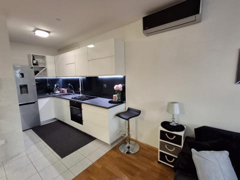 Kitchen or kitchenette, oven, stove