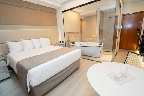 Bed, Hot Tub, TV and multimedia, hair dryier, locker, safe, air conditioner