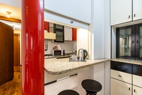 Coffee/tea facilities, dishwasher, furniture, microwave, oven, kitchen