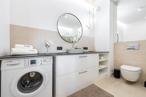 Toilet, Bathroom, towels, washing machine