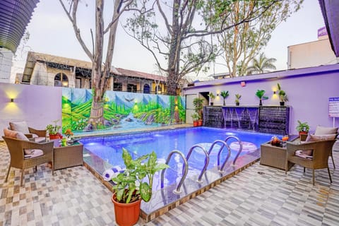Property building, Day, Garden, Evening entertainment, Pool view, Swimming pool