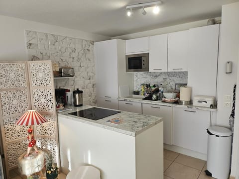 Kitchen or kitchenette, stove