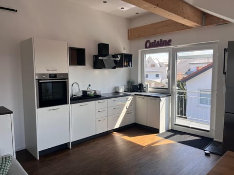 Kitchen or kitchenette, stove, kitchen