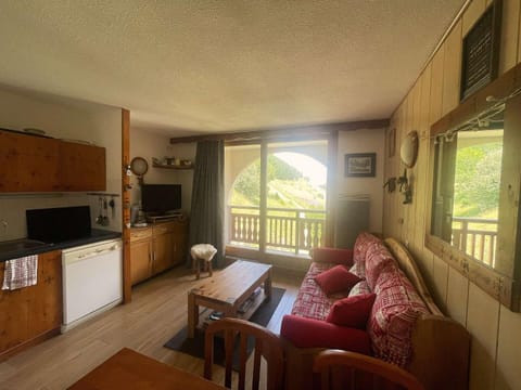 Bed, Living room, fireplace, kitchen