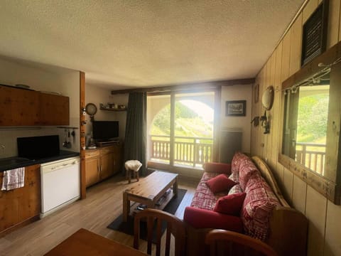 Bed, Living room, fireplace, kitchen