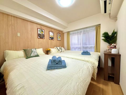 Bed, Photo of the whole room, Bedroom, towels, air conditioner