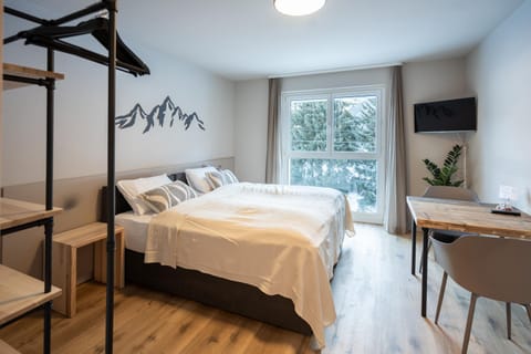 Bed, TV and multimedia, towels, wardrobe