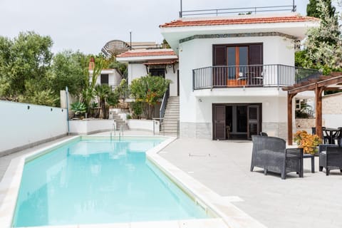 Property building, Living room, Swimming pool