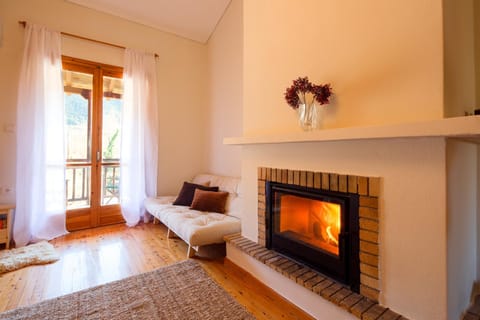 Bed, Living room, Seating area, fireplace