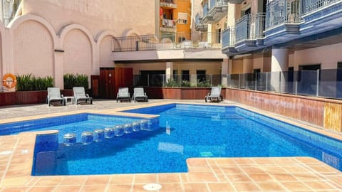 Property building, Living room, Swimming pool