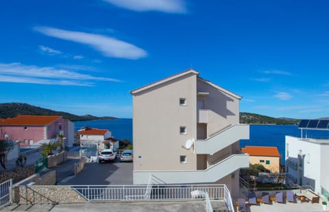 Property building, Facade/entrance, Sea view, Parking