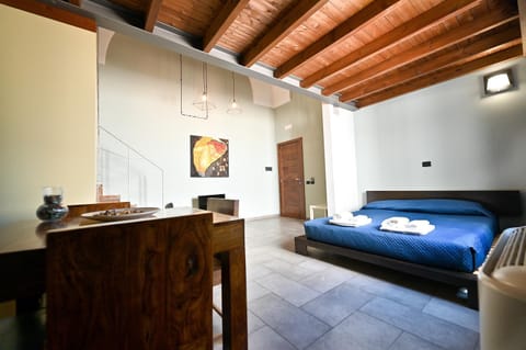 Bed, Living room, Seating area, Bedroom