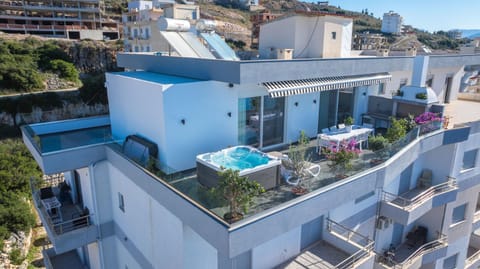 Property building, Patio, Day, Natural landscape, Bird's eye view, City view, Pool view, Sea view, Swimming pool, sunbed