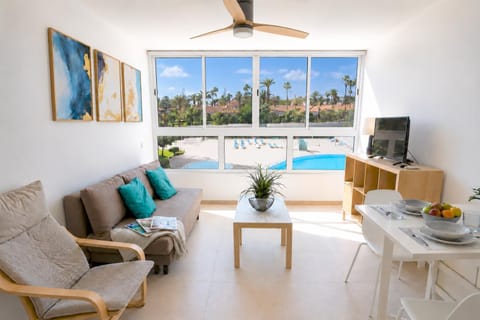 TV and multimedia, Living room, Photo of the whole room, Seating area, Dining area, Garden view, Pool view, soundproof