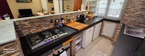 Kitchen or kitchenette, oven, stove