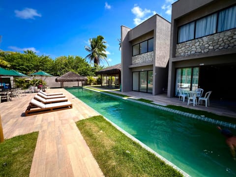 Property building, Patio, Facade/entrance, Day, Garden view, Swimming pool, sunbed