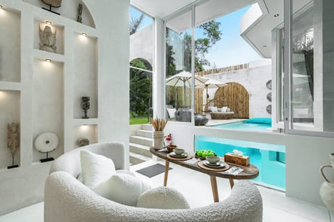 Living room, Seating area, Pool view