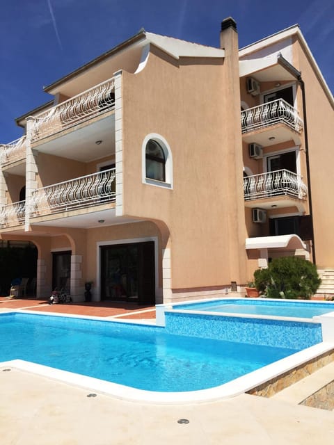 Facade/entrance, Swimming pool