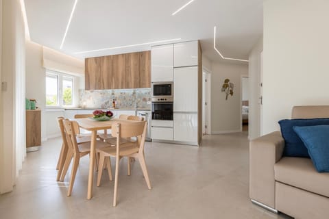 Kitchen or kitchenette, Living room, Seating area, Dining area, dishwasher, oven, stove