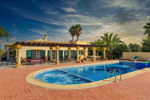 Swimming pool, sunbed