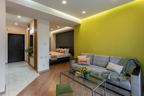 Bed, Living room, Seating area, Bedroom
