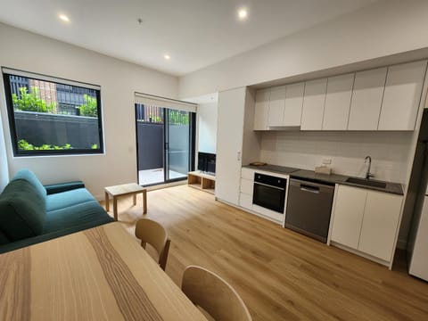 Living room, Dining area, dishwasher, microwave, oven, storage, stove