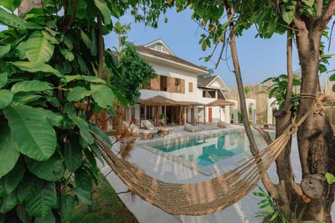 Property building, Seating area, Pool view, Swimming pool