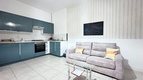 Kitchen or kitchenette, Living room, Seating area, oven, stove, toaster