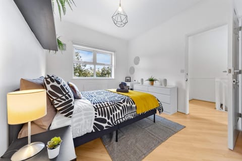 Bed, Photo of the whole room, Bedroom, flat iron, hair dryier, towels, wardrobe