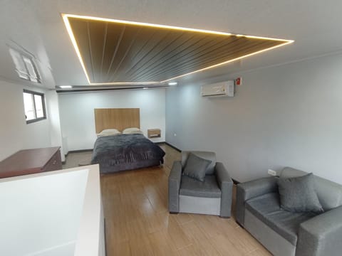 Bed, Photo of the whole room, Seating area, Bedroom, air conditioner