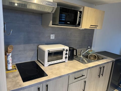 Kitchen or kitchenette, stove