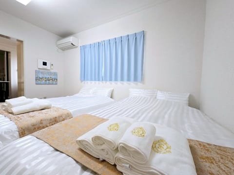 Bed, Photo of the whole room, Bedroom, towels, air conditioner