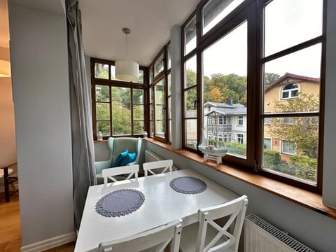 View (from property/room), Living room, Seating area, Dining area