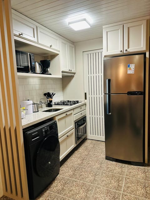 Kitchen or kitchenette, oven, stove, toaster