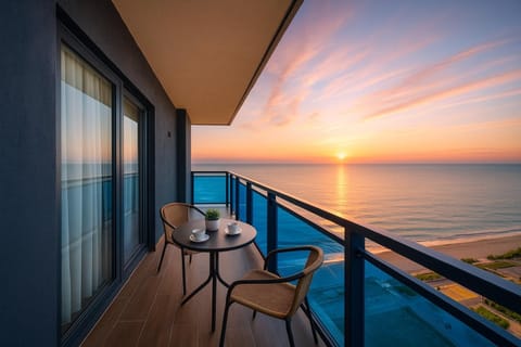 Patio, Day, Natural landscape, Coffee/tea facilities, View (from property/room), Balcony/Terrace, Living room, Seating area, Dining area, Sea view, Sunrise, Sunset