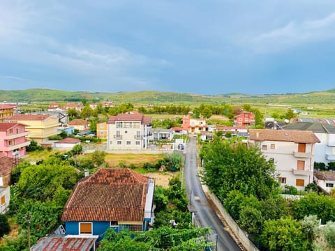 Property building, Spring, Day, Neighbourhood, Natural landscape, Bird's eye view, City view, Mountain view, Street view, Location