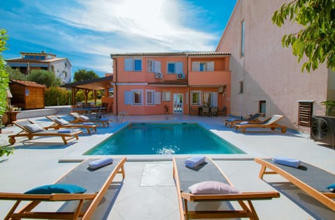 Property building, Patio, Pool view, sunbed
