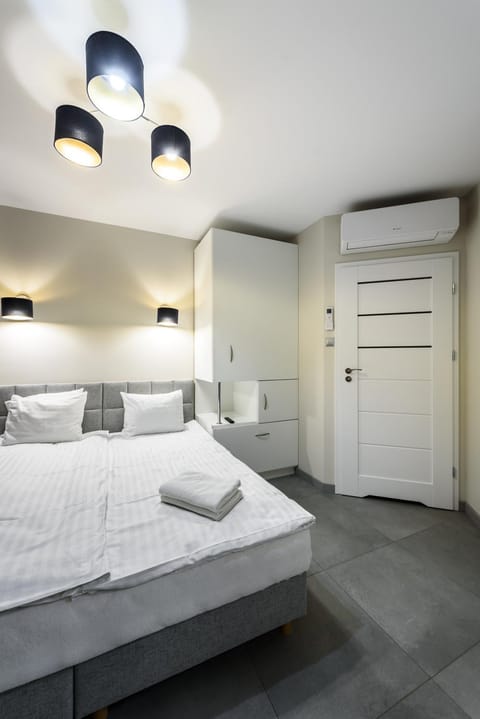 Bed, Photo of the whole room, Bedroom, towels, wardrobe