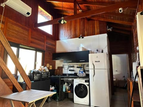 Kitchen or kitchenette, Dining area, oven, stove, washing machine, air conditioner