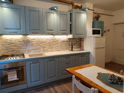 Kitchen or kitchenette, stove