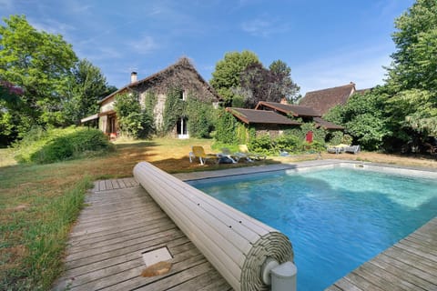 Property building, Living room, Swimming pool