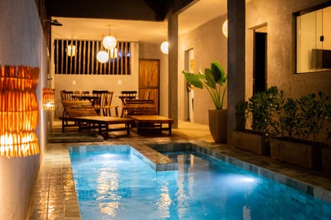 Patio, Night, Pool view, Swimming pool, sunbed