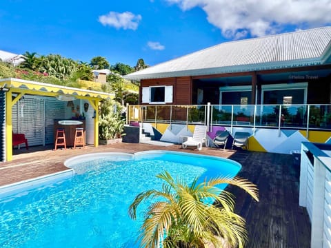 Property building, Patio, Day, Pool view, Swimming pool, sunbed